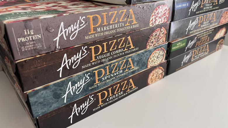 Side view of various Amy's pizza boxes