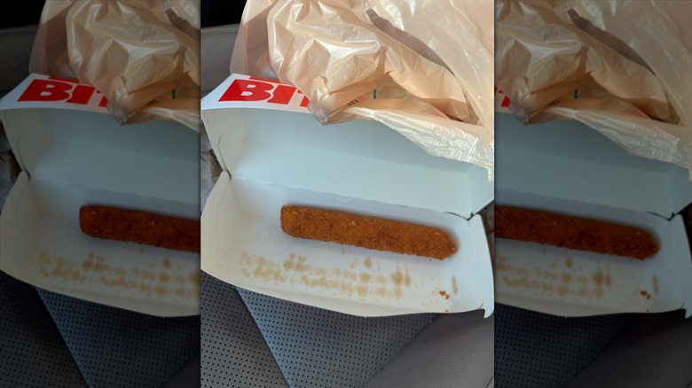 7-Eleven Buffalo Chicken Roller in white paper container