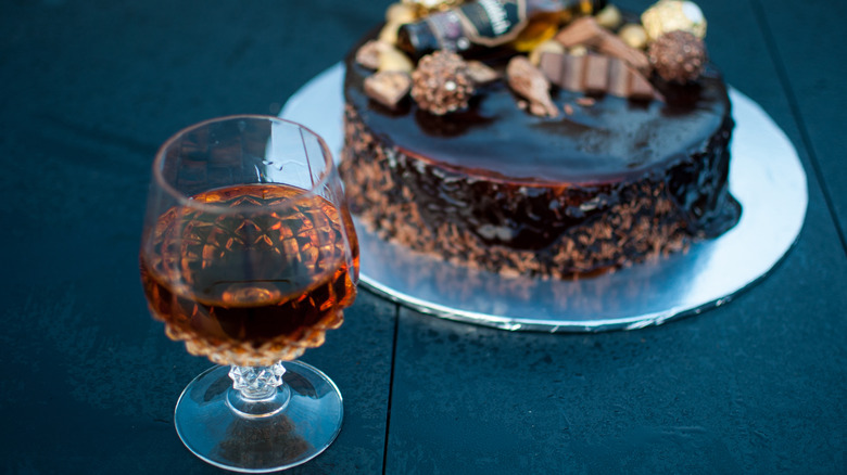 chocolate cake with whiskey glass