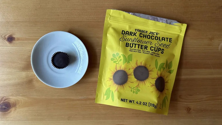 Trader Joe's Dark Chocolate Sunflower Seed Butter Cups on wooden table