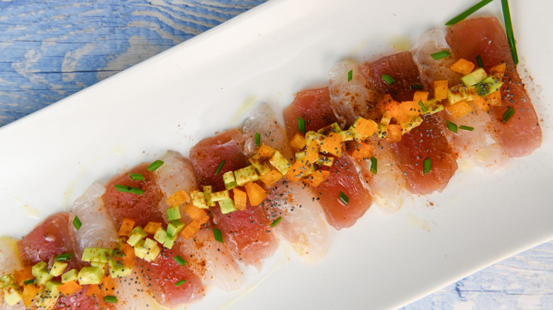 fish crudo with garnishes