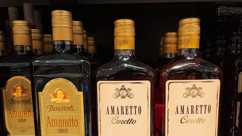 Bottles of amaretto on store shelf