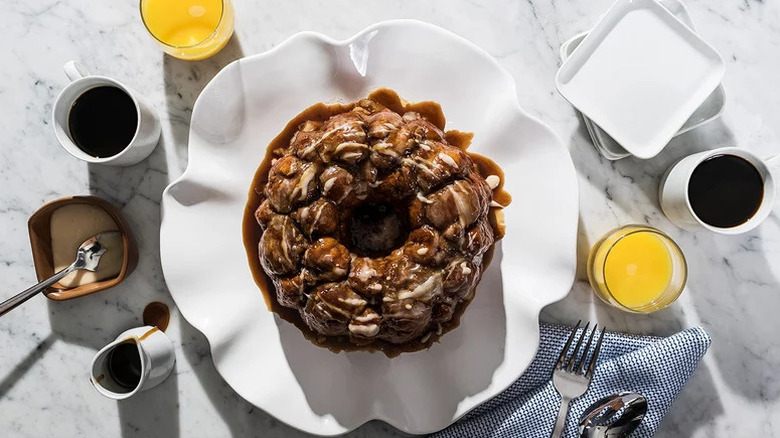 Bourbon-Maple Monkey Bread on scalloped white plate