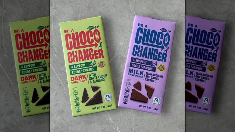 Two Choco Changer chocolate bars in green and purple packaging