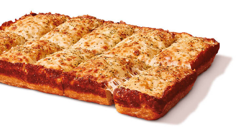 Rectangular cheesy pizza bread on white background
