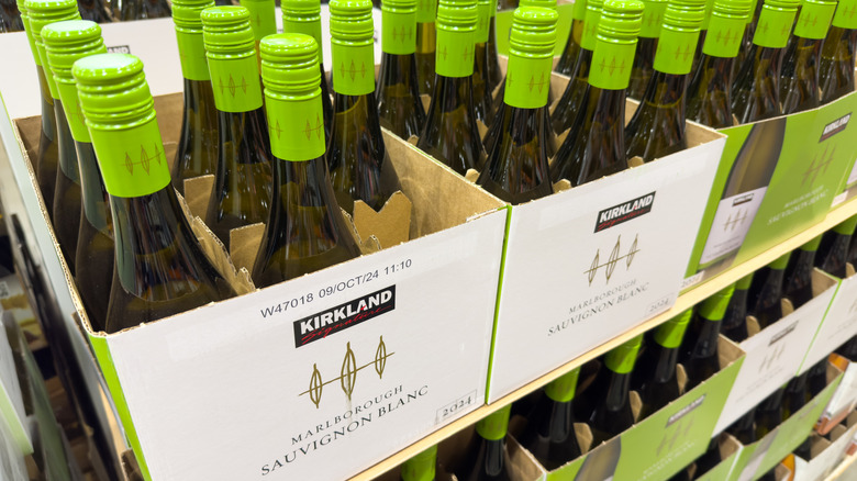 boxes of Kirkland Signature sauvignon blanc bottles in boxes on store shelf