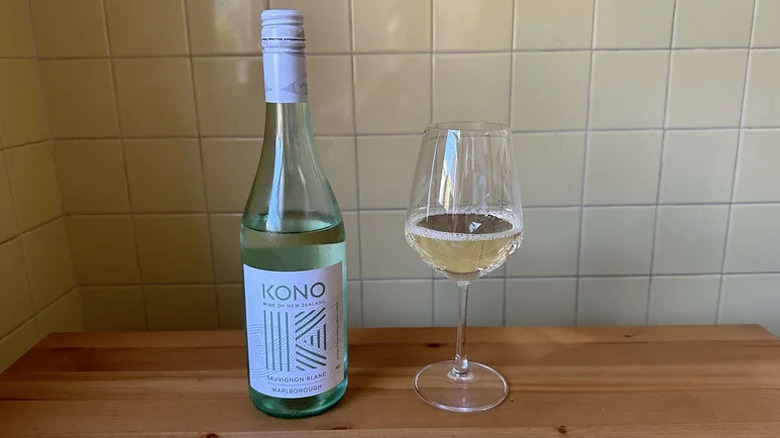 Glass of Kono Sauvignon Blanc on wooden table