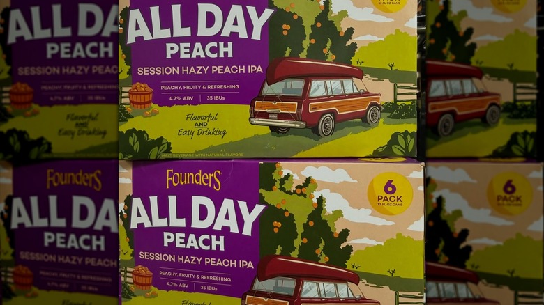 Stacked six pack boxes of All Day Peach IPA
