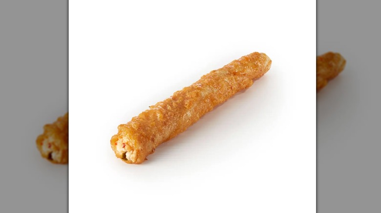 Cheesy pepper jack taquito on white background