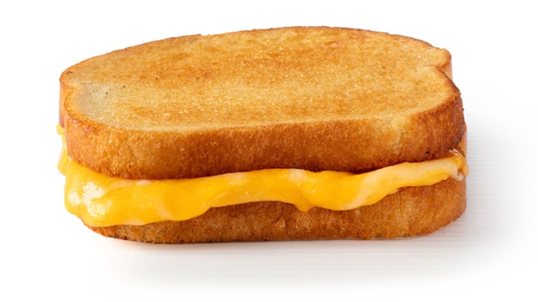 Grilled cheese on white background