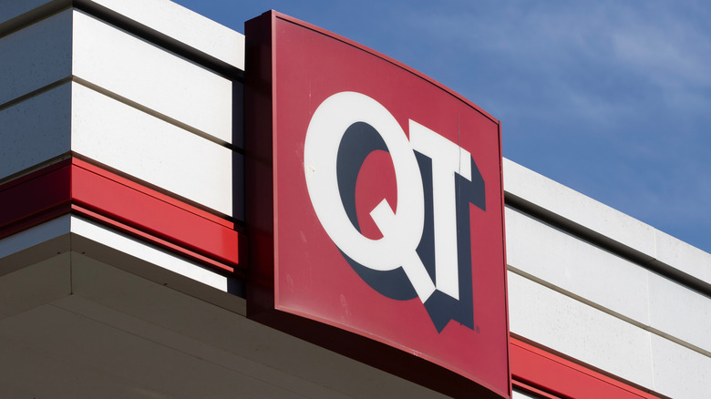 QuikTrip sign on building against blue sky