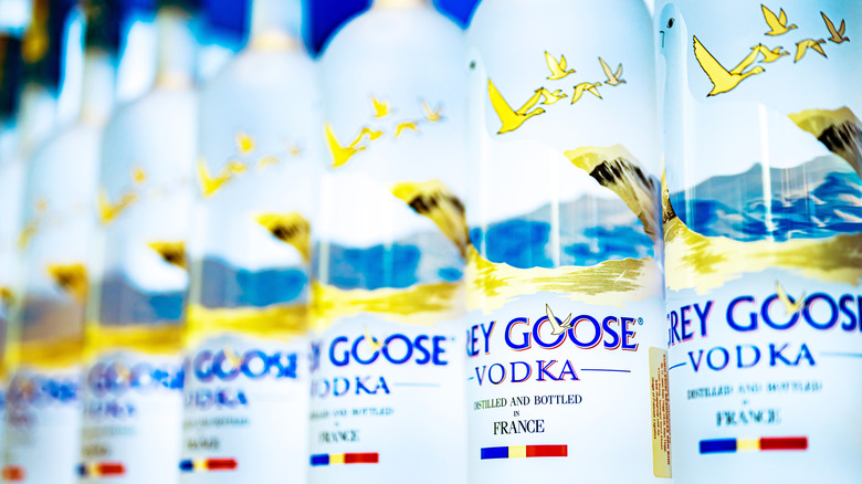 Bottles of Grey Goose vodka on a shelf