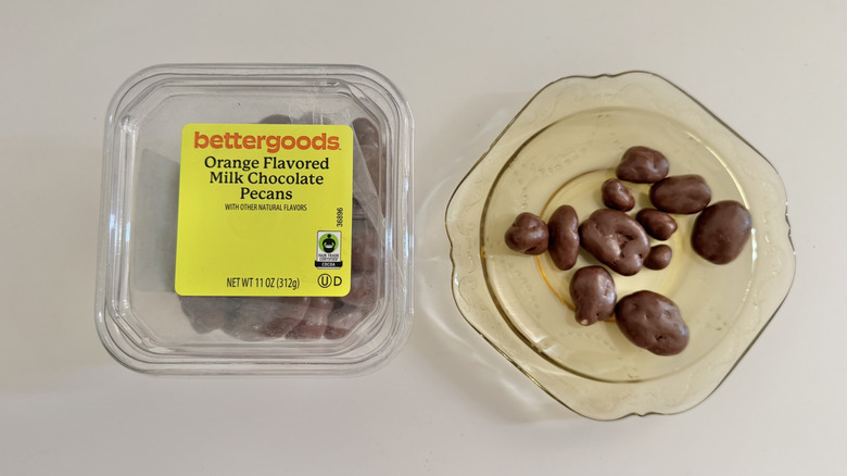 bettergoods Orange milk chocolate pecans on a small plate