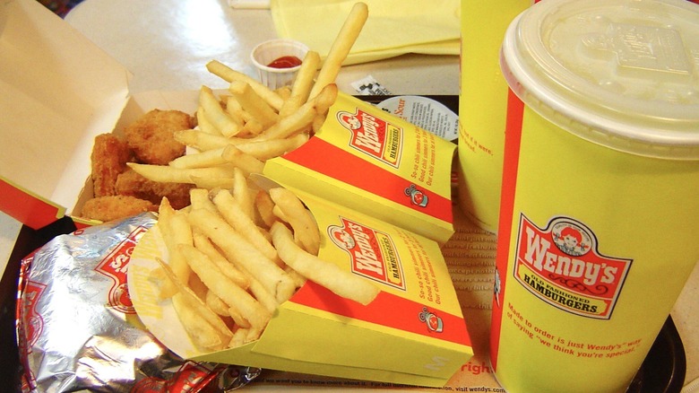 Several Wendy's menu items in classic yellow packaging