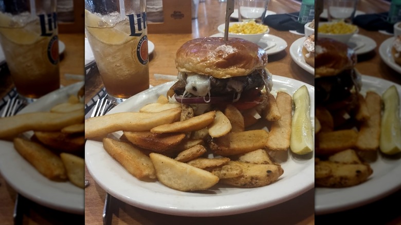 Burger on white plate at Texas Roadhouse