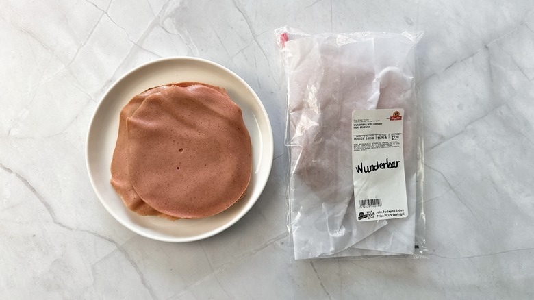 sliced bologna on bread with package of Wunderbar bologna alongside
