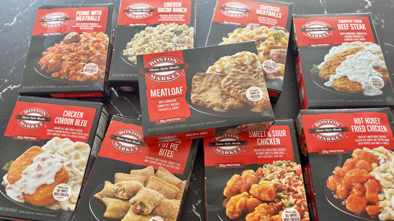Various Boston Market frozen meals laid out on countertop