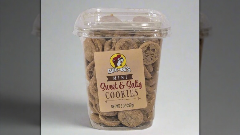 A container of Buc-ee's Sweet and Salty Mini Cookies on a grey background