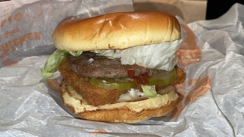 Burger King surf and turf burger on white parchment wrapping