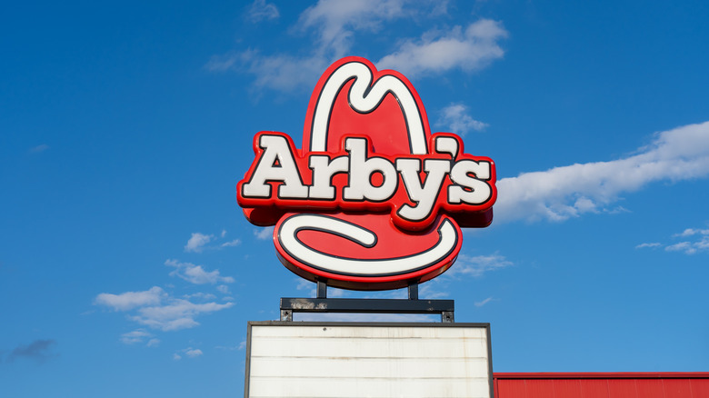 Arby's sign with blue sky in background