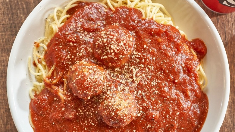 Bowl of spaghetti with marinara and meatballs