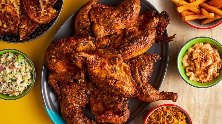 Nando's grilled chicken on black plate