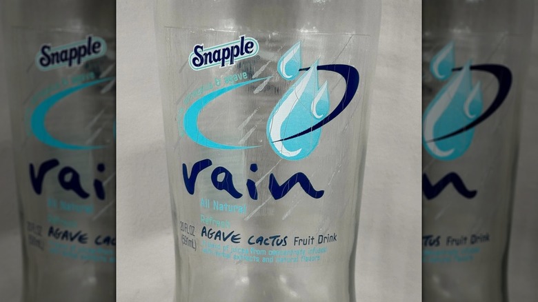 close up of empty Snapple Rain bottle mirrored with black border