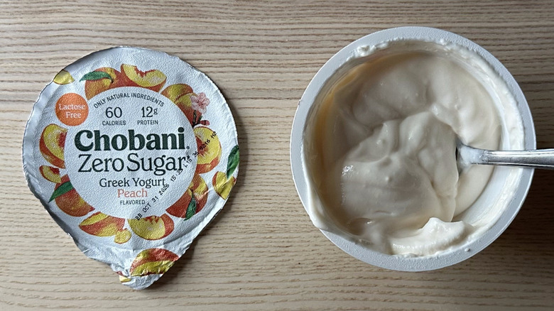Peach zero sugar Chobani yogurt on wooden table