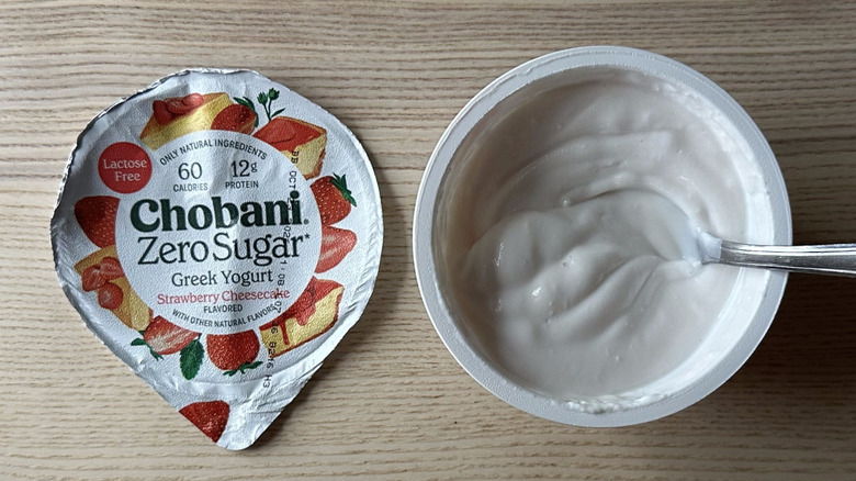 Strawberry Cheesecake zero sugar Chobani yogurt on wooden table