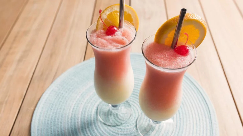 Aerial view of two slushies with red gradient effect and orange wheels.