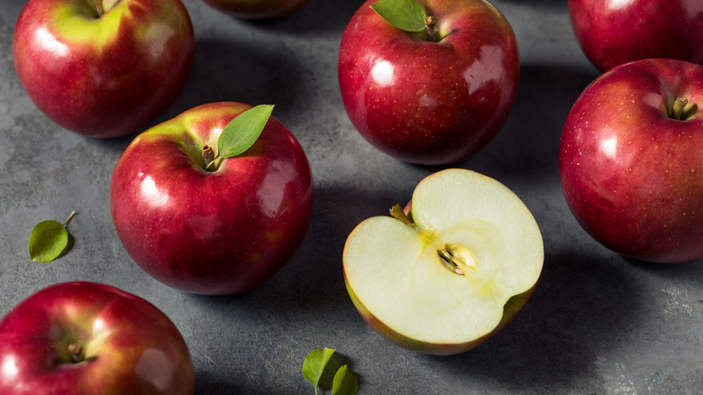 McIntosh apples against a slate grey background