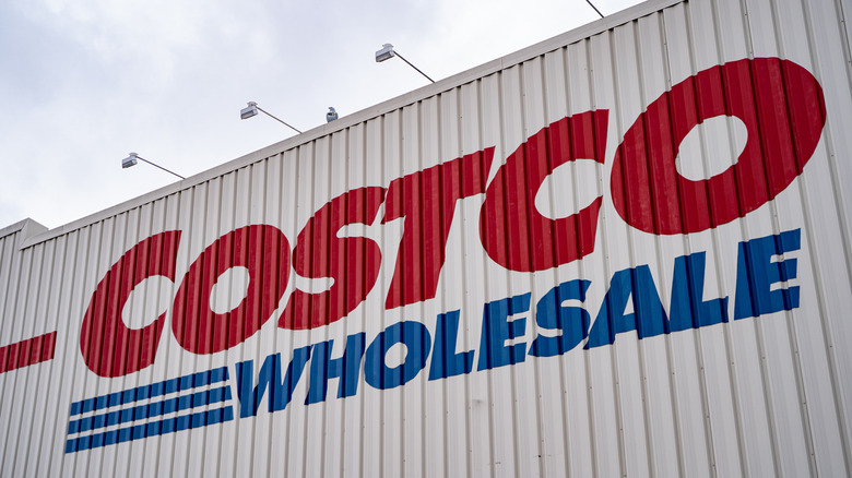 Close up of Costco Wholesale exterior sign on building wall
