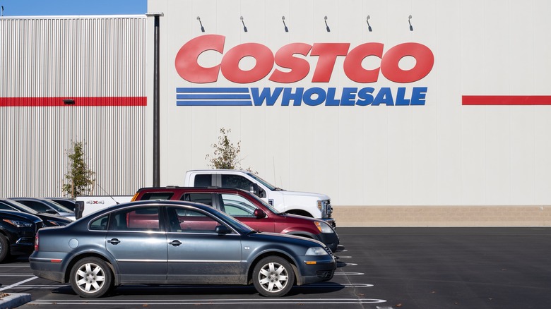A Costco store front with parking lot