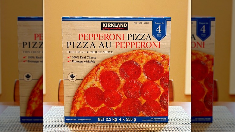 Kirkland Signature Thin Crust Pepperoni Pizza in box on table