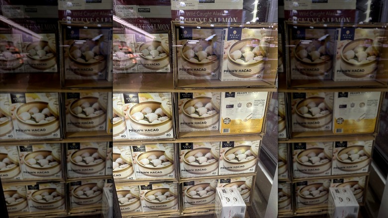 Boxes of Royal Asia Prawn Hacao stacked in freezer at Costco