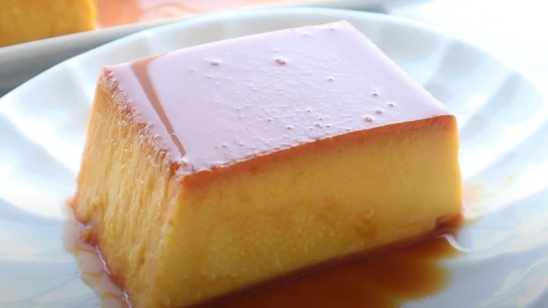 Slice of Japanese kabocha squash pudding on plate