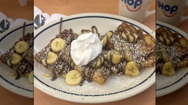Banana Nutella crepes from IHOP served on white plate