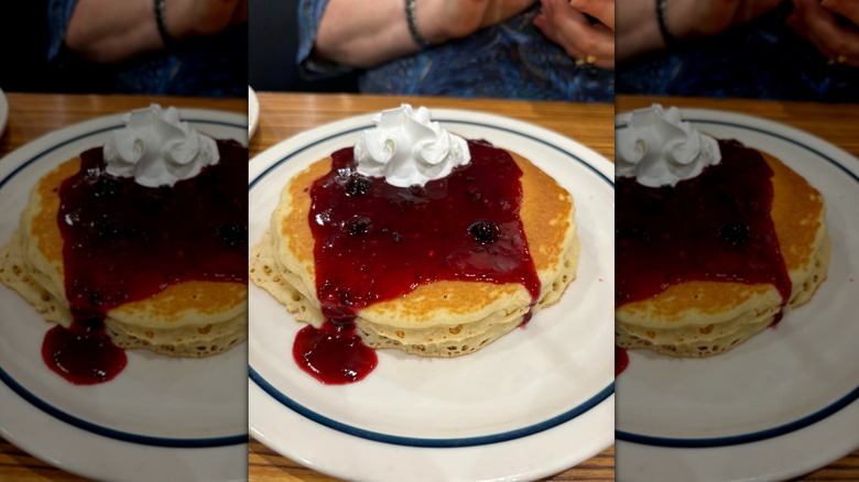 IHOP's Rooty Tooty Fresh 'N Fruity pancakes stacked on white plate