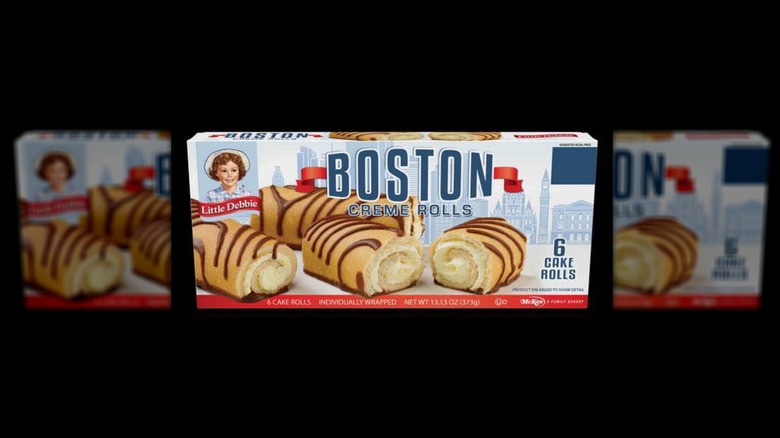 Box of Little Debbie Boston Creme Rolls on black background