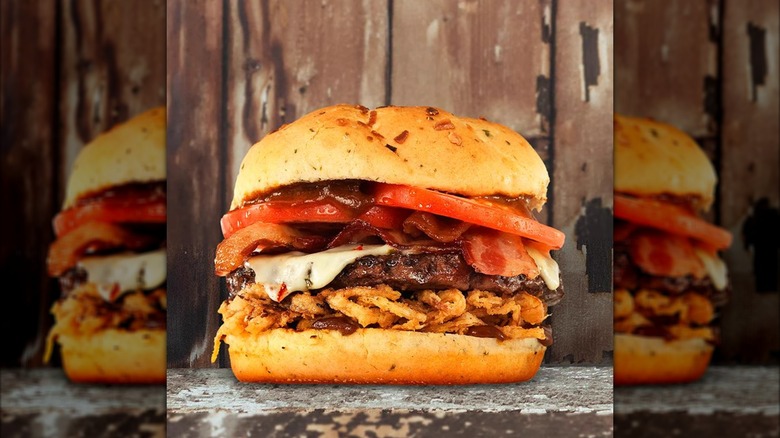 Red Robin steak burger with crispy onions, bacon, and tomatoes