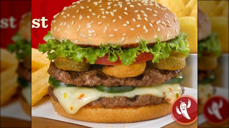 Double beef burger with  ﻿jalapeños, melty cheese, lettuce, and tomato