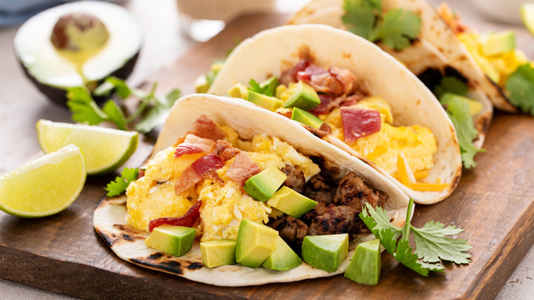 Breakfast tacos with bacon, egg, and avocado
