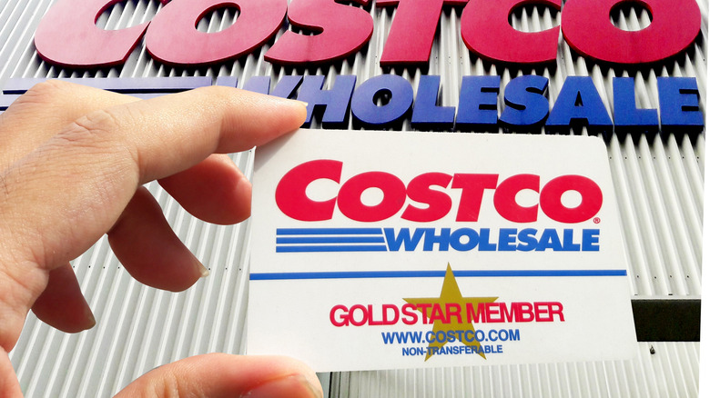 hand holding Costco membership card