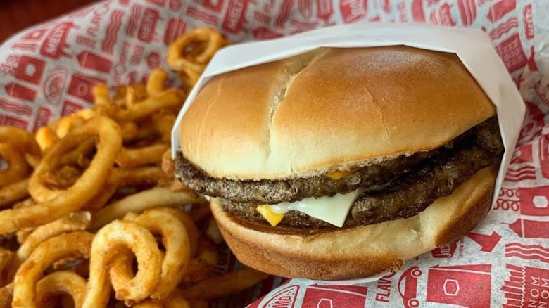 The Ultimate Cheeseburger and curly fries from Jack In The Box