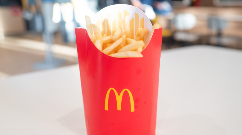 Close-up of container of McDonald's French fries on table
