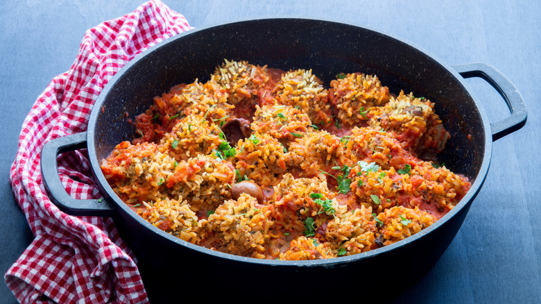"Porcupine" beef and rice meatballs in casserole dish