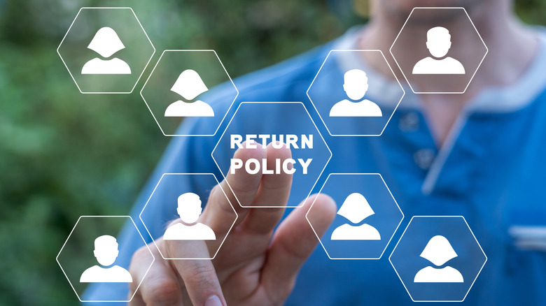 foreground image of superimposed buttons, with a "Return Policy" button in the middle, with a man in a blue polo shirt, out of focus behind the buttons, reaching to tap the Return button