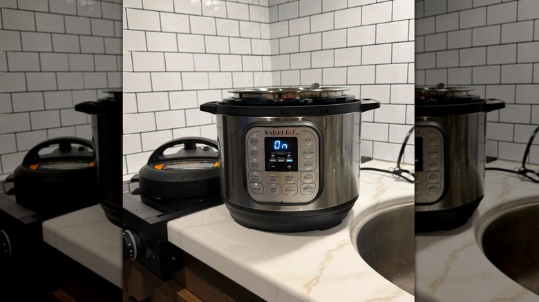 Open Instant Pot on white countertop