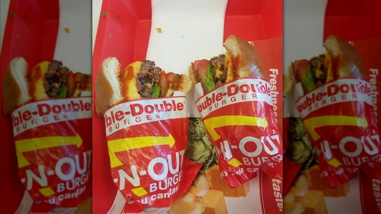 Double Double cut in half on In-N-Out tray, mirrored image