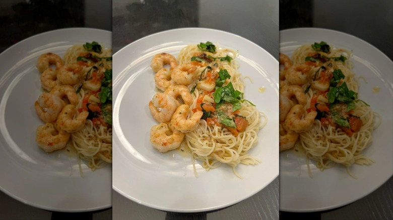 Kirkland Garlic Butter Shrimp on pasta on white plate